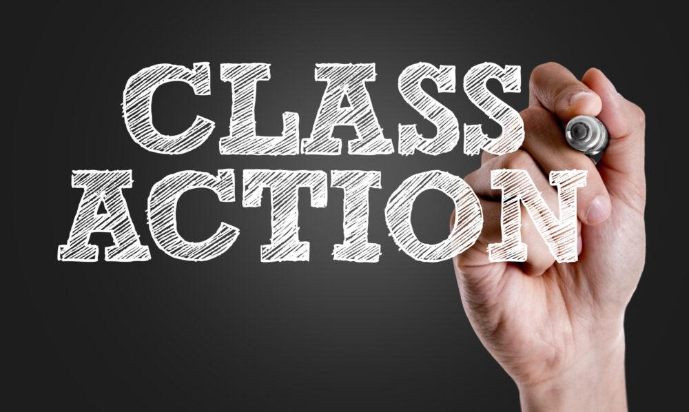 Hand writing the text: Class Action