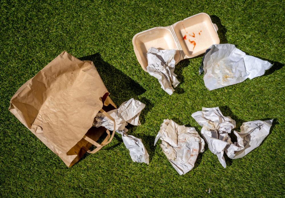 Discarded Fast Food Wrappers on Ground