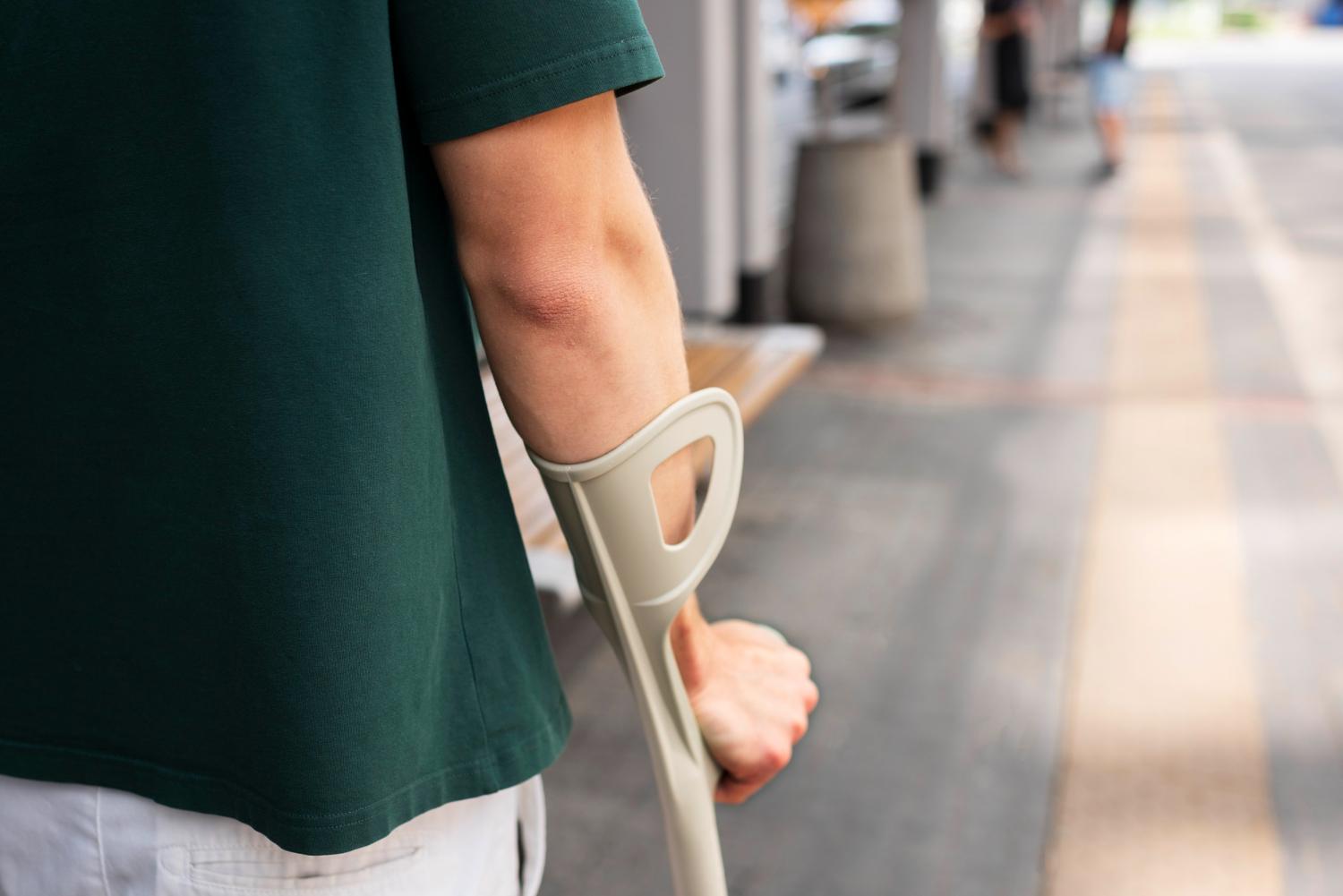 injured person on crutches