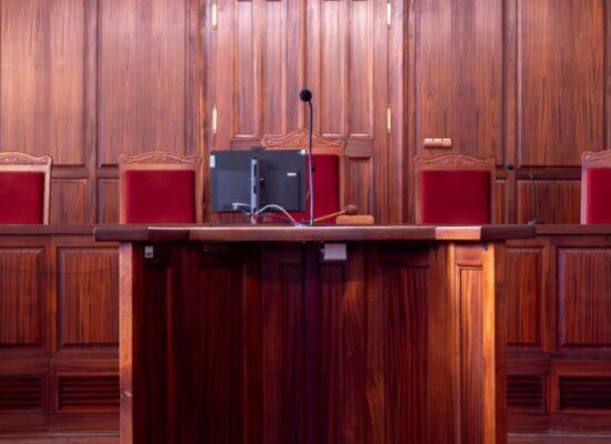 a photograph of an empty court room