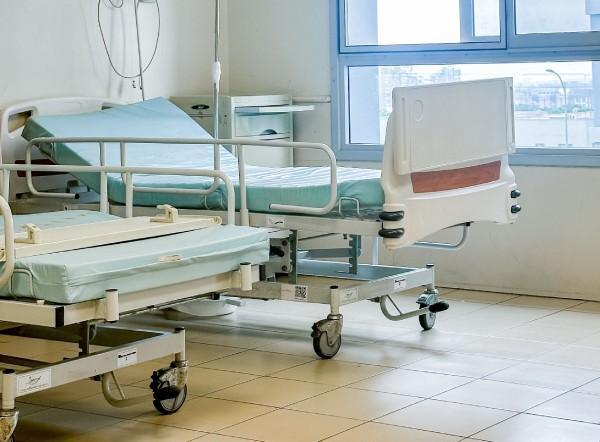 two empty hospital beds